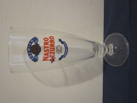 beer glass from the Peroni brewery in Italy with the inscription 'Nastro Azzurro Premium Birra Beer Peroni 1846'