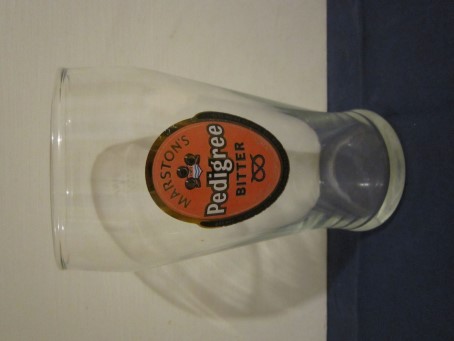 beer glass from the Marston's brewery in England with the inscription 'Marston's Pedigree Bitter Alcohol 4.5% By Volume Brewed In Burton On Trent Using Yeast From The Burton Union Sets'
