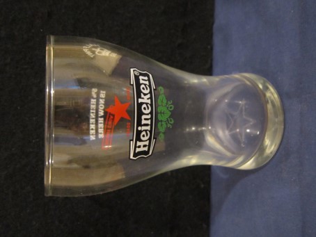 beer glass from the Heineken brewery in Netherlands with the inscription 'Heineken'