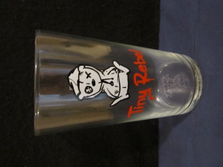 beer glass from the Tiny Rebel brewery in Wales with the inscription 'Tiny Rebel'