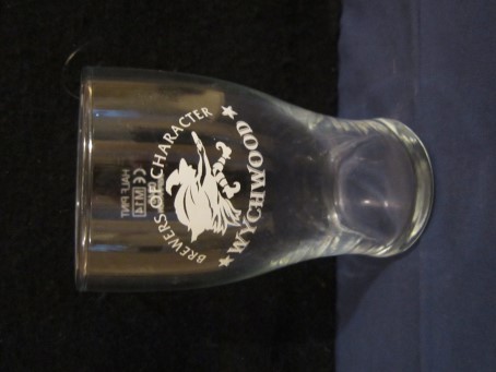 beer glass from the Wychwood  brewery in England with the inscription 'Wychwood Brewers Of Character'