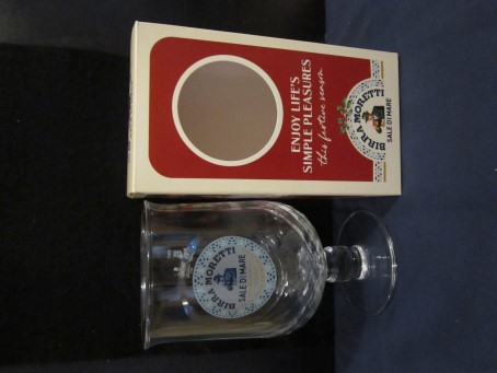 beer glass from the Moretti brewery in Italy with the inscription 'Birra Moretti Sale Di Mare, With Italian Sea Salt Unfiltered Premium Lager'