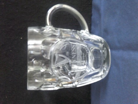 beer glass from the Guinness  brewery in Ireland with the inscription 'EST 1759 Guinness Original Extra Stout Original Recipe, The Original Extra Stout Dark And Lively '