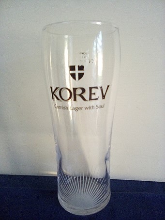 beer glass from the St. Austlell  brewery in England with the inscription 'Korev Cornish Lager With Soul'