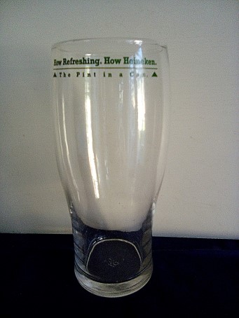 beer glass from the Heineken brewery in Netherlands with the inscription 'How Refreshing. How Heineken. The Pint In A Can'