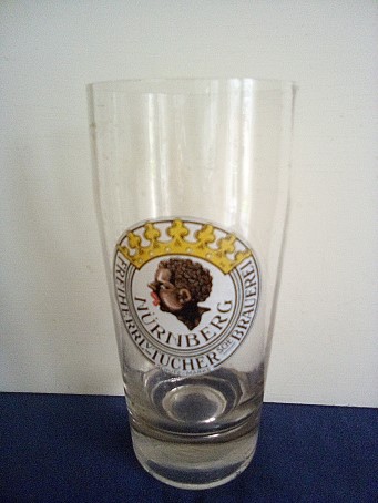 beer glass from the Tucher Brau brewery in Germany with the inscription 'Nurnberg Freiherrl Tucher Brauerei'