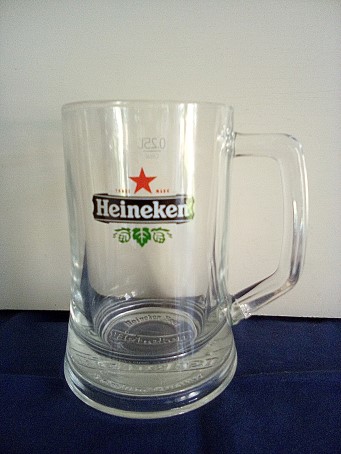 beer glass from the Heineken brewery in Netherlands with the inscription 'Heineken'