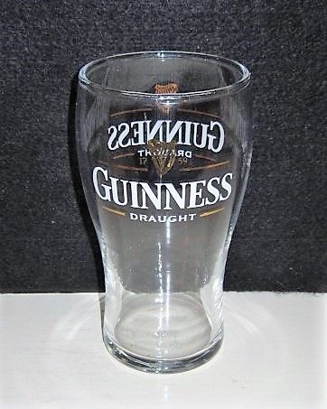 beer glass from the Guinness  brewery in Ireland with the inscription 'Guinness Draught '