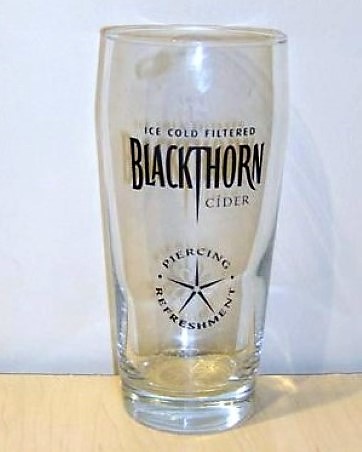 beer glass from the Matthew Clark  brewery in England with the inscription 'Ice Cold Filtered Blackthorn Cider Piercing Refreshment'