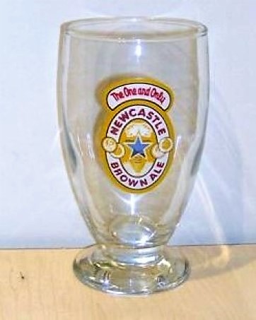 beer glass from the Newcastle Breweries  brewery in England with the inscription 'The One And Only Newcastle Brown Ale'