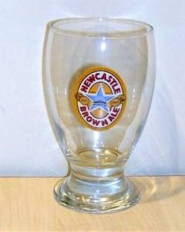 beer glass from the Newcastle Breweries  brewery in England with the inscription 'Newcastle Brown Ale'