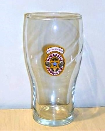 beer glass from the Newcastle Breweries  brewery in England with the inscription 'The One And Only Newcastle Brown Ale'