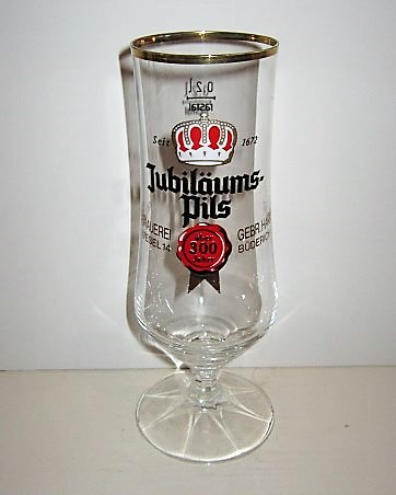 beer glass from the Aktien Kaufbeuren brewery in Germany with the inscription 'Seit 1672 Jubilaums Pils Kronenbrauerei Wesel 14 Gebr Hardering Buderich'