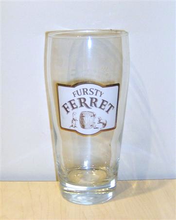 beer glass from the Hall & Woodhouse brewery in England with the inscription 'Fursty Ferret'