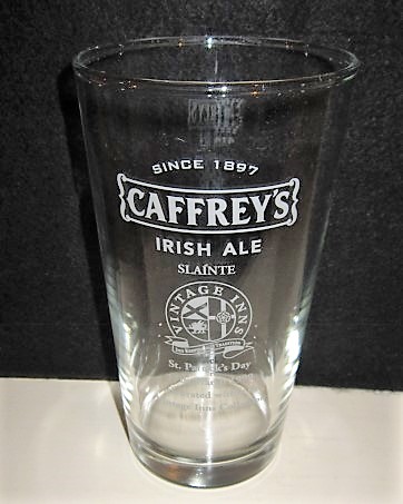 beer glass from the Caffrey's brewery in Northern Ireland with the inscription 'Caffrey's Irish Ale Since 1897 St. Patrick's Day 17th March 1999 Celebrated Within The Vintage Inns Collection'