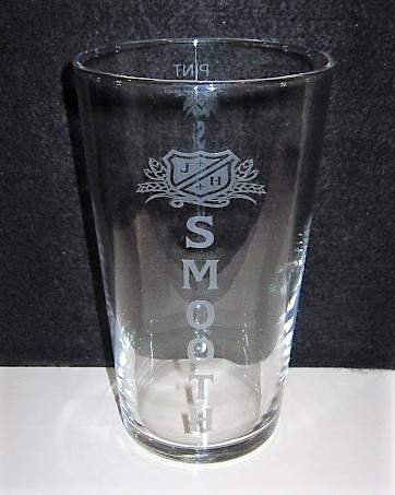 beer glass from the Joseph Holt brewery in England with the inscription 'J H Smooth'