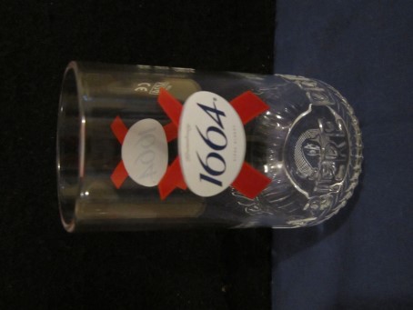 beer glass from the Kronenbourg brewery in France with the inscription 'Kronenbourg 1664 Biere Blond, La Biere Premium Francaise'