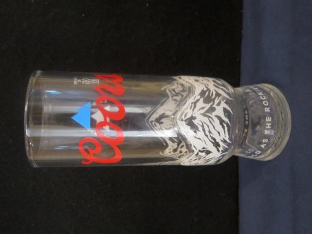 beer glass from the Molson Coors brewery in Canada with the inscription 'Coors, Cold As The Rockies'